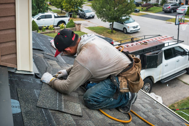 Professional Storm Damage Roof Repair technician working in McClure, PA